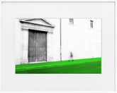 A limited edition museum-quality photograph featuring a black and white image of a building's facade with a green lawn in the foreground, titled 'Valencia, 2017'. The photograph is signed and includes a certificate of authenticity.