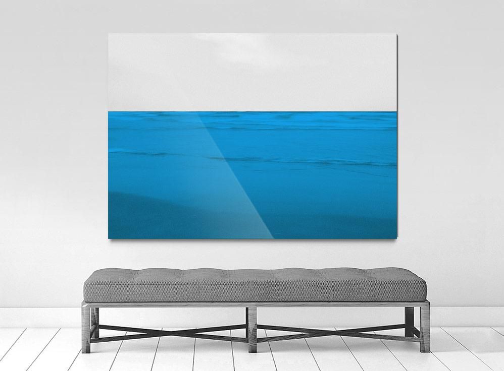 A limited edition museum-quality photograph featuring a abstract blue and white horizontal image, with a certificate of authenticity.