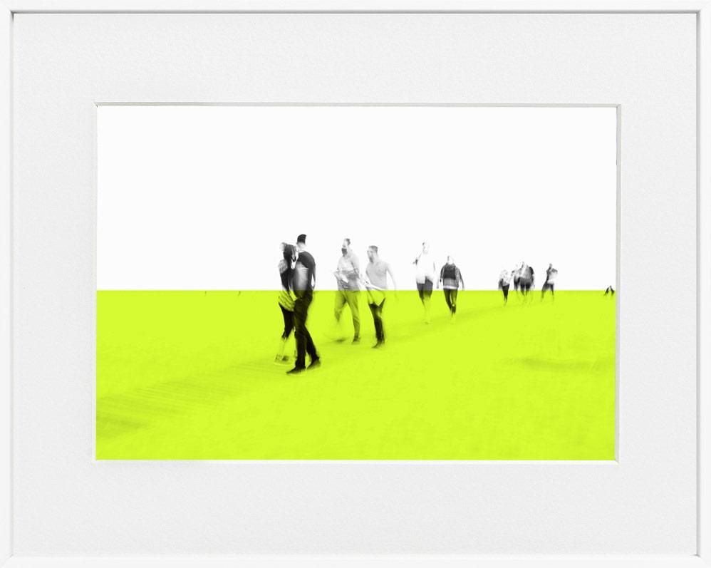 A framed limited edition museum-quality photograph depicting a group of people on a bright yellow surface with a white background, presented in a minimalist style.