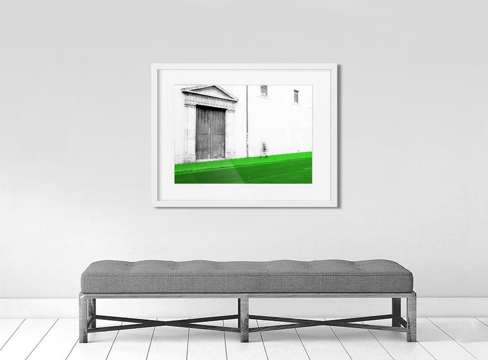 A limited edition museum-quality photograph featuring a black and white image of a building's facade with a green lawn in the foreground, titled 'Valencia, 2017'. The photograph is signed and includes a certificate of authenticity.
